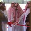 Prince Badr bin Sultan bin Abdul Aziz, Deputy Governor of Makkah Province, cuts the ribbon to officially open Thuwal Embroidery Center